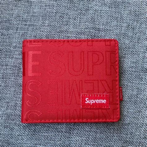 farfetch supreme wallet men.